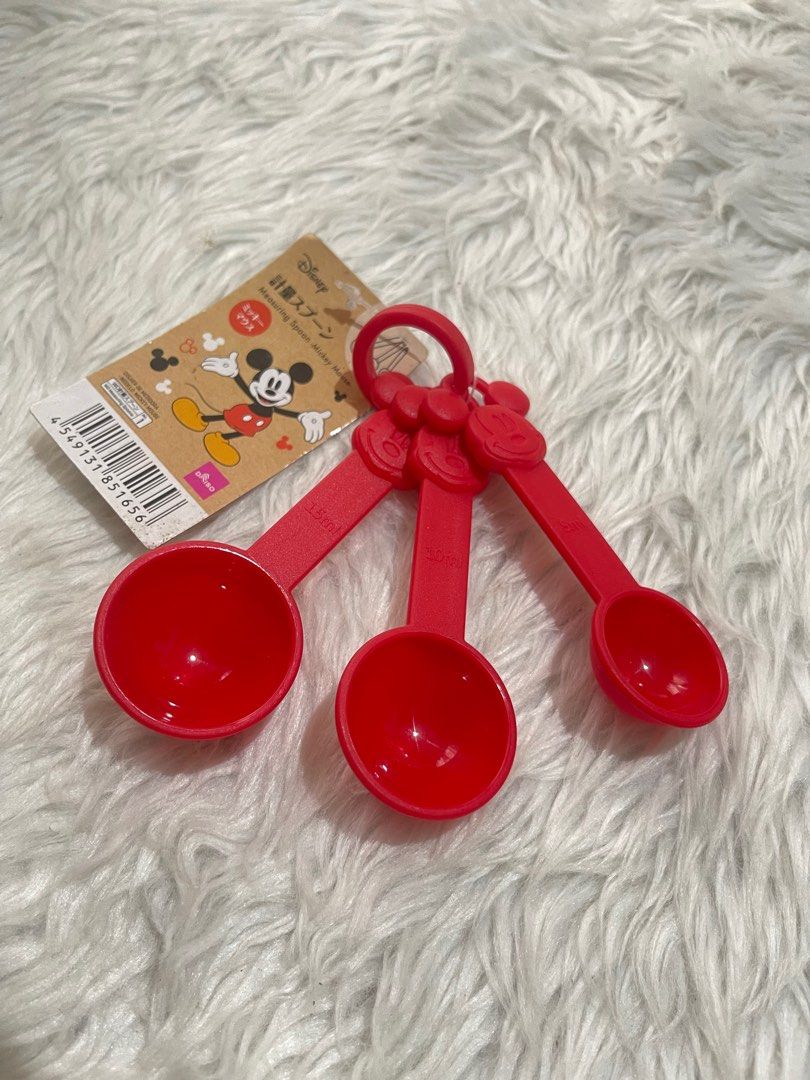 Disney Mickey Mouse Measuring Spoons (Category: Bakeware) located in Bayambang. Submitted by foursiblings081228 (Listing ID 1410969083, Image 3). Description: Set of Disney Mickey Mouse measuring spoons. Available in black and red. Each set includes three spoons of different sizes. The spoons are attached to a ring for easy storage. Perfect for measuring ingredients in the kitchen. Brand new with tags. ₱300 each J&t 📍Bayambang, Pangasinan.