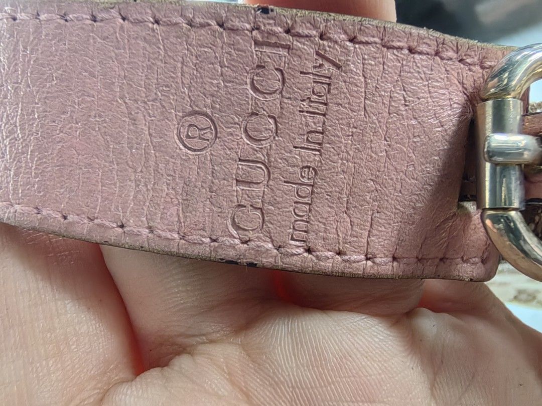 Gucci Handbag with Pink Interior (Category: Luxury Bags & Wallets) located in San Pedro. Submitted by charlie0603 (Listing ID 1404771928, Image 2). Description: - Authentic Gucci handbag - Pink interior - Zipper closure - Gold-toned zipper - Distinct exterior pattern - Visible serial number on pink tag - Well-maintained condition.