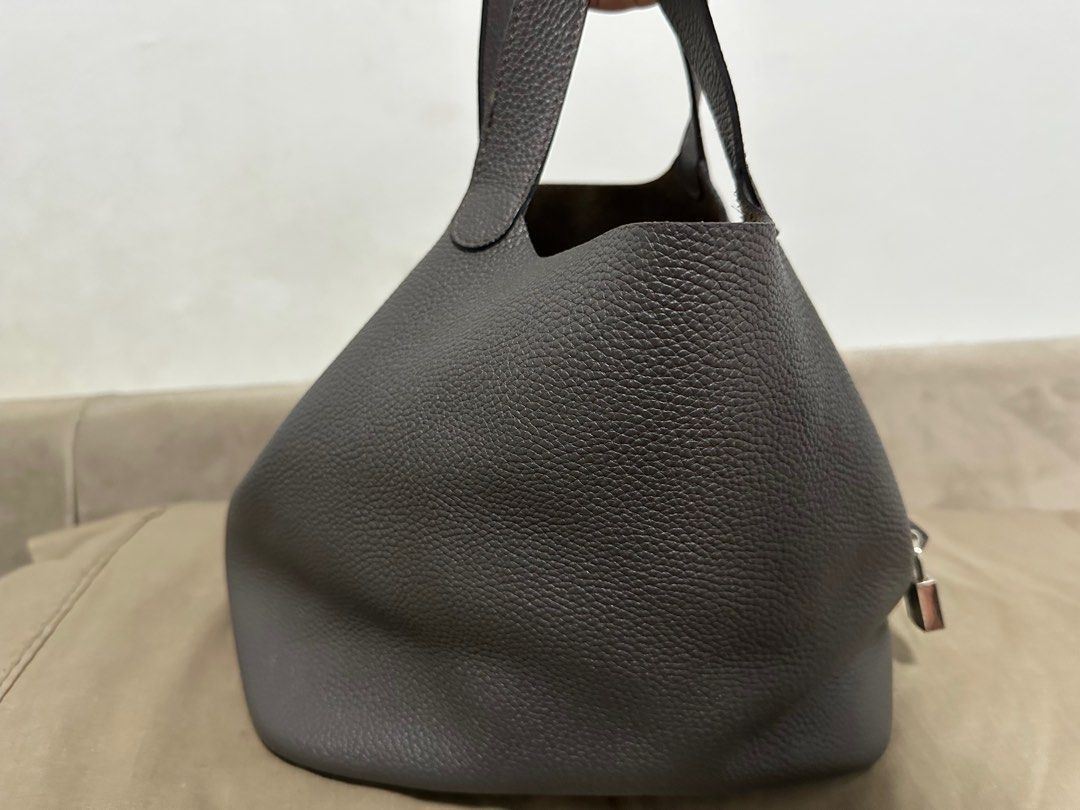 Hermes Picotin Lock 18 Handbag (Category: Luxury Bags & Wallets) located in Quezon City. Submitted by alen13 (Listing ID 1411059482, Image 2). Description: Hermes Picotin Lock 18 handbag in grey. Includes padlock but missing key Made in France. Self authentication recommended.