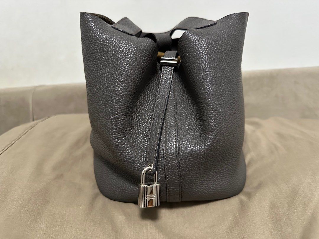 Hermes Picotin Lock 18 Handbag (Category: Luxury Bags & Wallets) located in Quezon City. Submitted by alen13 (Listing ID 1411059482, Image 1). Description: Hermes Picotin Lock 18 handbag in grey. Includes padlock but missing key Made in France. Self authentication recommended.