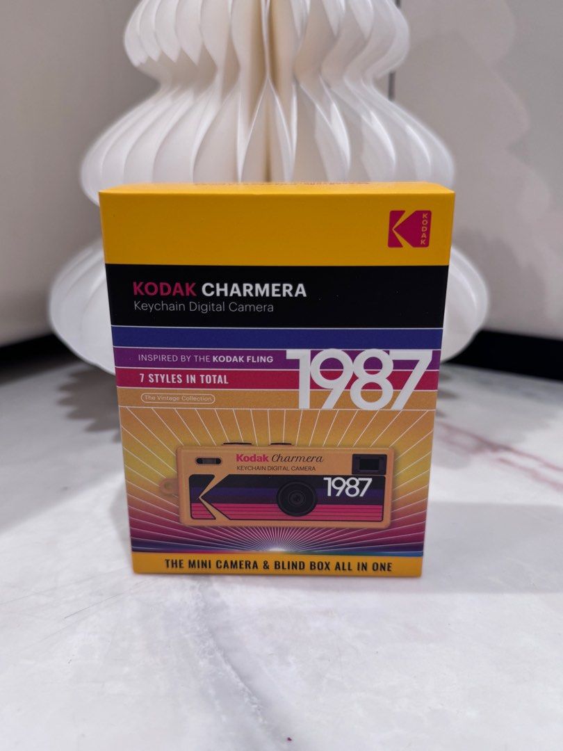 Kodak Charmera Keychain Digital Camera Type 03 (Category: Cameras) located in Manila. Submitted by helloseptembermnl (Listing ID 1410918758, Image 3). Description: - Kodak Charmera: Mini digital camera and blind box! - Inspired by the Kodak Fling. - Features 7 vintage styles. - Includes USB cable. - 1987 edition. Type 03 Design Opened Box.