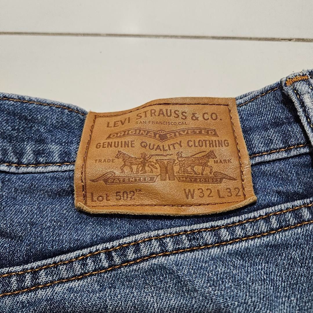 Levi's 502 Big E Demim Pants (Category: Jeans) located in Makati City. Submitted by thriftfindsbymj (Listing ID 1411033213, Image 3). Description: "🧥 Levi's 502 Big E Demim Pants | Size: 32 | Color: Denim Blue 📏 Width: 32” | Length: 38” 💰 Price: ₱1,200.00 ✨ Condition: 9/10 // Ripped on the left side di ko po alam kung issue sya // heel drag Color may vary due to lighting. #ThriftFindsbyMJ #UkayFinds #ThriftFindsPH" .