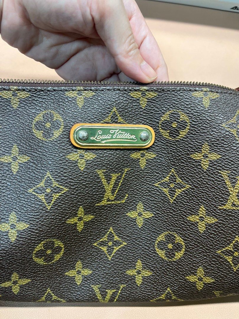 Louis Vuitton Eva Monogram Clutch Bag (Category: Luxury Bags & Wallets) located in Manila. Submitted by seagypseaph (Listing ID 1410962618, Image 2). Description: 50% OFF! Happening from May 18-25! Louis Vuitton (LV) Monogram Canvass Eva Clutch Vintage Bag Price negotiable. DM me! Rank: A-AB (Very Good to Good condition) (For self-authentication) Condition: Preloved. Vintage. With visible patina on the leather, and light scratches on the hardware