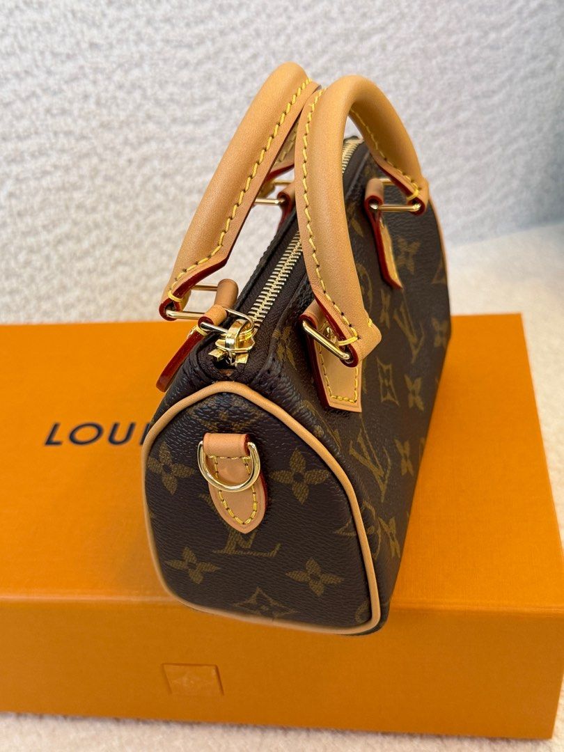 Louis Vuitton Nano Speedy Handbag (Category: Luxury Bags & Wallets) located in San Pablo. Submitted by passionproject (Listing ID 1410983686, Image 3). Description: - Authentic Louis Vuitton Nano Speedy handbag - Iconic Monogram canvas - Rolled leather handles - Detachable shoulder strap - Gold-tone zipper and hardware - Includes original box - Perfect for carrying essentials -Complete with Receipt -Negotiable.