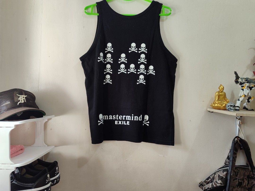 Mastermind JAPAN x Exile Tank Top (Category: Sleeveless) located in Antipolo. Submitted by grailed_rizal (Listing ID 1410942544, Image 2). Description: Size: 19 x 26 Black tank top with "LOVEDREAM HAPPINESS" print on the front and skull/"mastermind EXILE" graphics on the back. Features "EXILE MONSTER" and "mastermind" branding. Collaboration item..