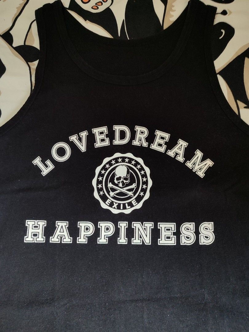 Mastermind JAPAN x Exile Tank Top (Category: Sleeveless) located in Antipolo. Submitted by grailed_rizal (Listing ID 1410942544, Image 3). Description: Size: 19 x 26 Black tank top with "LOVEDREAM HAPPINESS" print on the front and skull/"mastermind EXILE" graphics on the back. Features "EXILE MONSTER" and "mastermind" branding. Collaboration item..