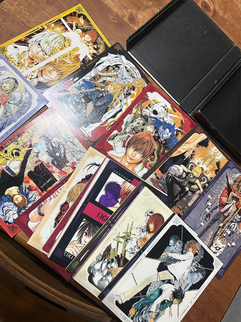 OFFERS Death Note Card Set (Category: Comics & Manga) located in General Santos City (Dadiangas). Submitted by rosushi (Listing ID 1410977959, Image 3). Description: Hearing offers. Cards are well kept. Death Note XL card set. Includes a box and multiple cards with various Death Note illustrations. The cards feature different characters and scenes from the series..
