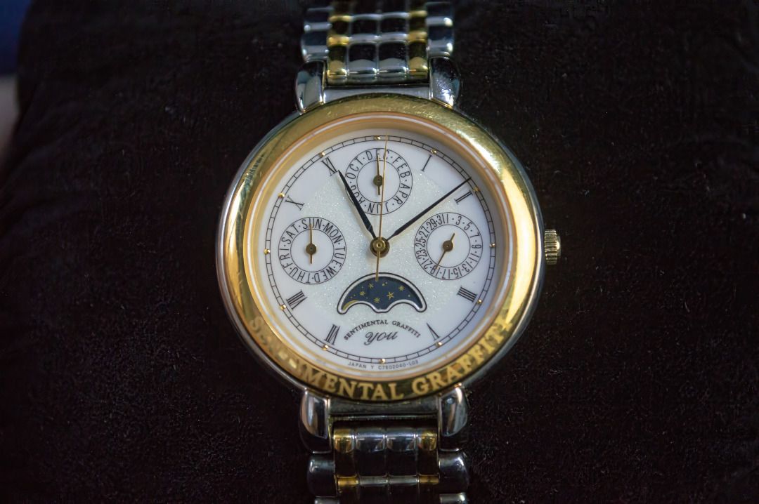 ORIENT Sentimental Graffiti You Moonphase watch (Category: Luxury Watches) located in Binan City. Submitted by chronotribeph (Listing ID 1411005257, Image 1). Description: ORIENT sentimental graffiti YOU moonphase details: Dial color: white/glitter white Movement: Quartz Sub dial Day/Date/Month : Good Condition Wrist Size: 6.1 inch Case Diameter: 32mm Case number: c7e204-00 Serial number: c7e02040-L03 Glass: no scratches Clean Dial with presentab