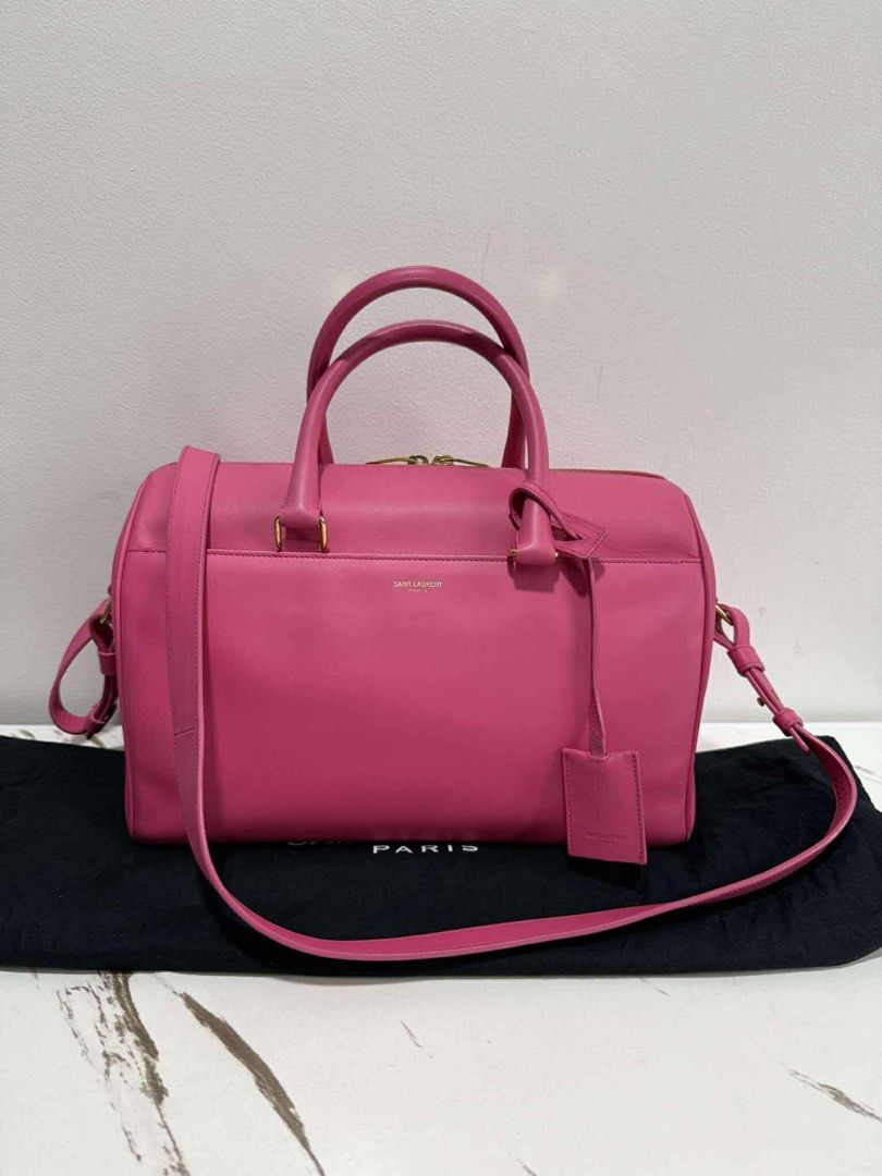 Original YSL Duffle Pink 2way Bag (Category: Luxury Bags & Wallets) located in Cavite. Submitted by authenticbagshavenbyvalg (Listing ID 1410926452, Image 1). Description: 💯Guaranteed Original Very good condition with dustbag Authentic Bags Haven No return No Exchange Money back guarantee unless proven fake No low ballers No Swap No Joy Reservers PLEASE MANAGE YOUR EXPECTATIONS, youre buying a preloved item. Accepts layaway on certain items 30% 