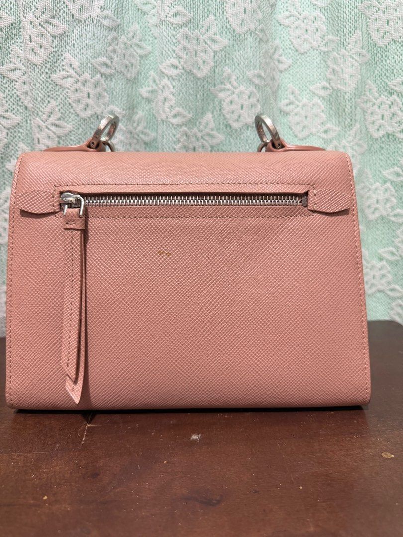 Prada Diagramme Chain Bag- JaPan surplus (Category: Luxury Bags & Wallets) located in Cavite. Submitted by luxurstreet (Listing ID 1410945584, Image 2). Description: - Color: Blush Pink - Chain strap - Flap closure with Prada logo - Interior zippered pocket - Made in Italy - Silver-toned hardware -Replace Chain -Self Authenticate .