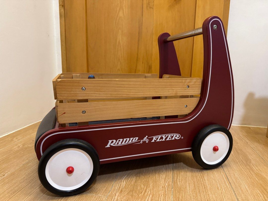 Radio Flyer Walker Wagon (Category: Infant Playtime) located in Cainta. Submitted by littlemissvietnam (Listing ID 1410995192, Image 2). Description: - Classic Radio Flyer walker wagon - Red and white design - Wooden wagon bed - Handle for easy pushing - White wheels with red accents - Designed for toddlers and young children - Helps with walking and toy carrying •Resistance clickers, not functioning anymore.