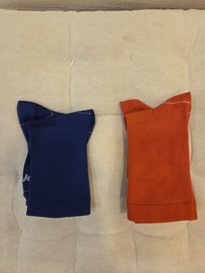 Rapha Socks (Category: Parts & Accessories) located in Singapore. Submitted by ddb99 (Listing ID 1411034454, Image 2). Description: Good condition lightly used Navy Blue & Dark Orange 1 for $15 2 for $25 comes with Rapha plastic packaging.