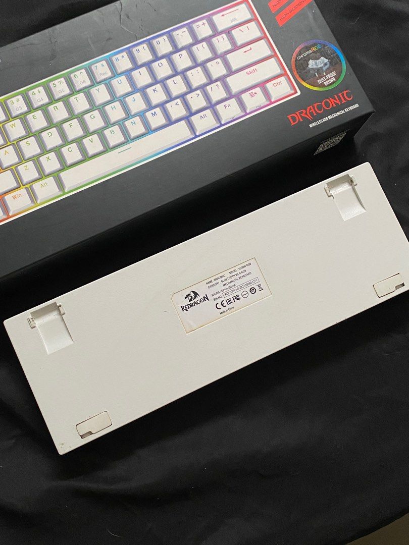 Redragon Draconic 60% Wireless Mechanical Keyboard (Category: Computer Keyboard) located in Malabon City. Submitted by declutteredbycole (Listing ID 1410935713, Image 3). Description: 100% working includes box & inclusions brown switches issue: - no keyboard legs (last pic) - needs cleaning .