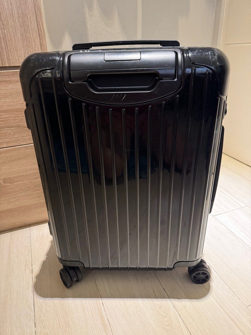 Rimowa Essential Cabin Suitcase Black (Category: Luggage) located in Makati City. Submitted by marckyboy (Listing ID 1410919951, Image 2). Description: - Original Black Rimowa Essential Cabin suitcase - Telescopic handle for easy maneuvering - TSA combination lock for security - Smooth multiwheel system - Interior with two Flex dividers and zipped compartments - Includes Rimowa dust bag - Minor scratches on the exterior - Negotiable upon viewing 