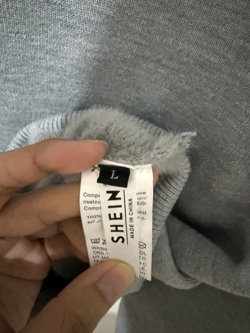 Shein Turtleneck Sweater - Gray - Size L (Category: Coats, Jackets and Outerwear) located in Cabanatuan. Submitted by declutterpg (Listing ID 1410923010, Image 3). Description: - 500 take both black and gray turtleneck - Shein gray turtleneck sweater - thermal lined - Size: L - Features: Long sleeves, ribbed hem - Color: Gray - Material: Soft, comfortable fabric - Versatile: Perfect for layering - Needs wash .