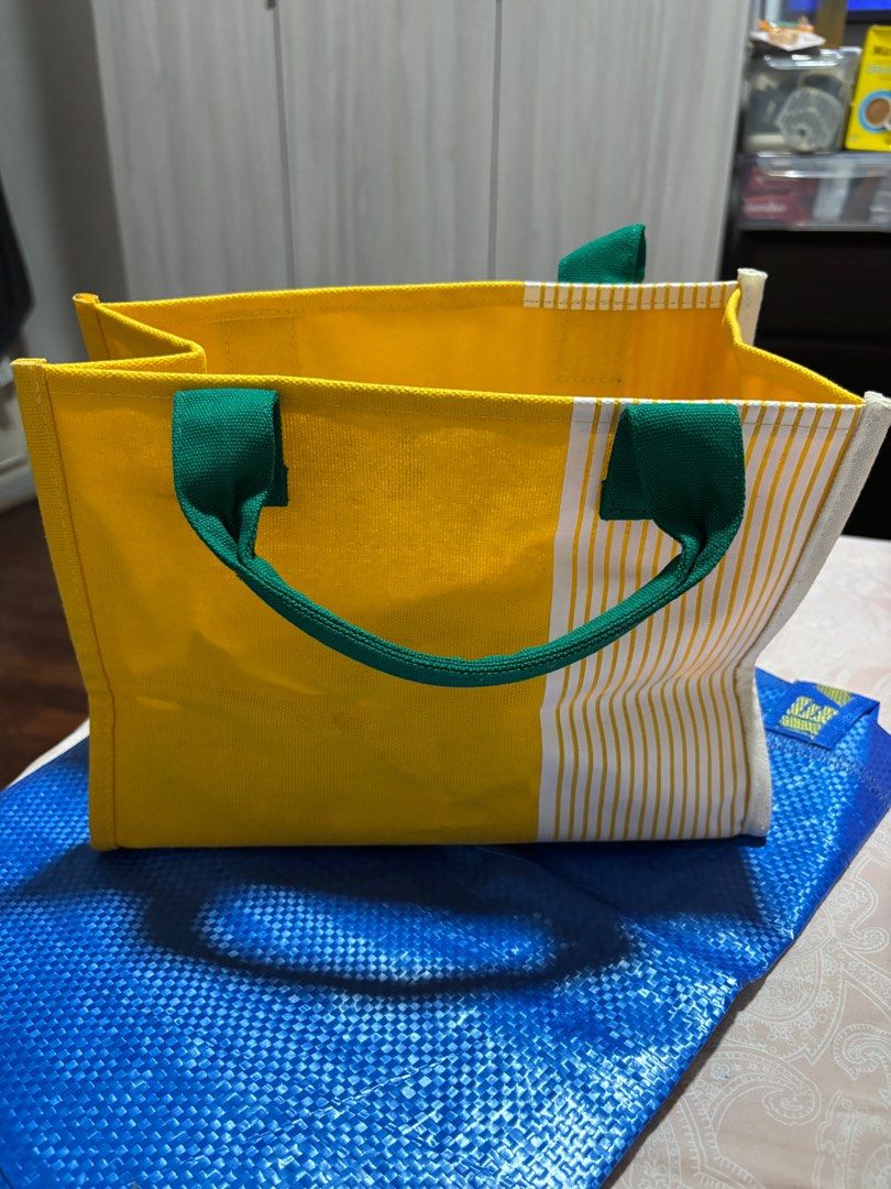 Starbucks Yellow Tote Bag with Bear Charm (Category: Tote Bags) located in Makati City. Submitted by vanbustling (Listing ID 1410918596, Image 1). Description: Mini tote bag.