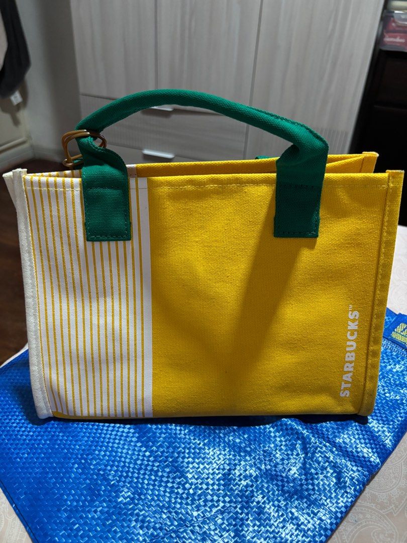 Starbucks Yellow Tote Bag with Bear Charm (Category: Tote Bags) located in Makati City. Submitted by vanbustling (Listing ID 1410918596, Image 2). Description: Mini tote bag.