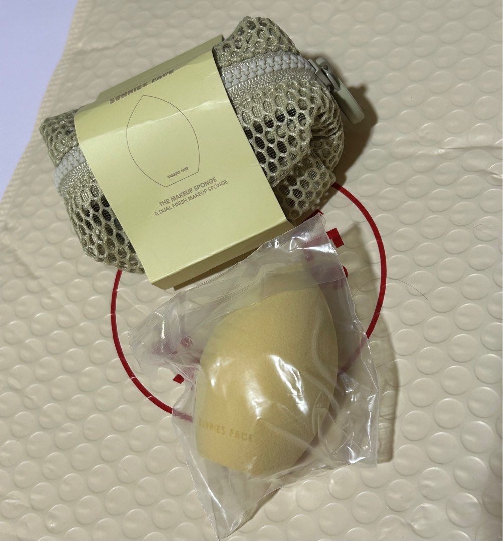 Sunnies Face The Makeup Sponge (Category: Makeup) located in Plaridel. Submitted by rn.yg (Listing ID 1411053147, Image 2). Description: - Brand new Sunnies Face Makeup Sponge - Dual-finish design for a natural makeup look - Designed to absorb less product - Includes a convenient mesh pouch - Unused and ready to use.