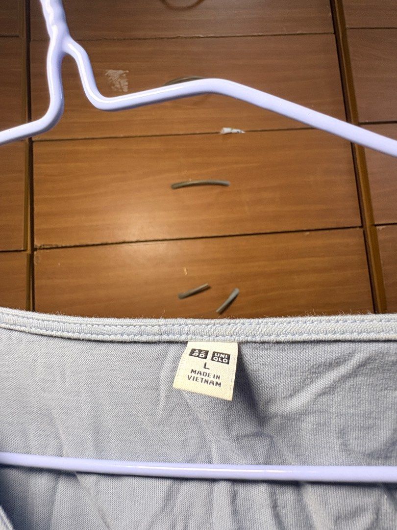 Uniqlo V-Neck Dress (Category: Dresses) located in Makati City. Submitted by itsnaoczar (Listing ID 1410945815, Image 3). Description: - Light blue dress - V-neck design - Short, puffy sleeves - Tiered skirt - Made in Vietnam - Condition: Some stains (blue paint).