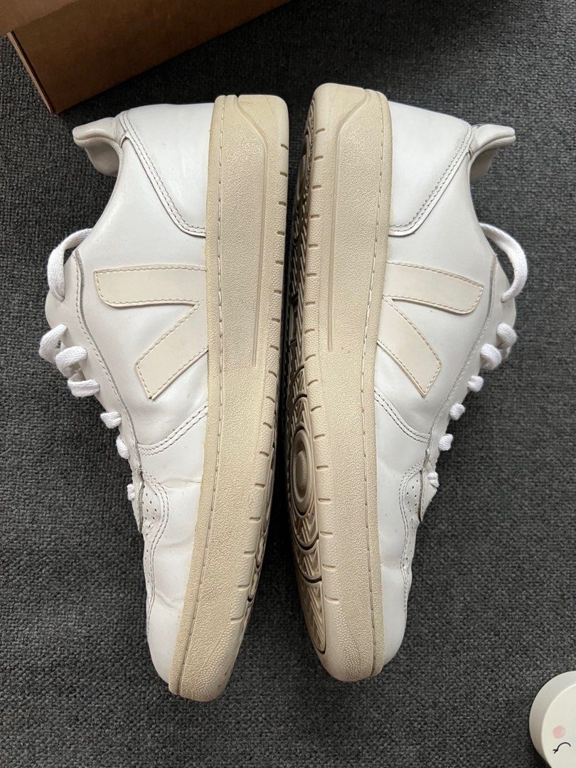 Veja V-10 White Leather Sneakers (Category: Sneakers) located in Quezon City. Submitted by authenticcloset (Listing ID 1410973990, Image 3). Description: - Veja V-10 sneakers - White leather - US 10 / EUR 43 - Iconic V logo - Some sole wear - Includes original box - Made in Brazil Please refer photo for the condition and manage your expectations as this is a used item.