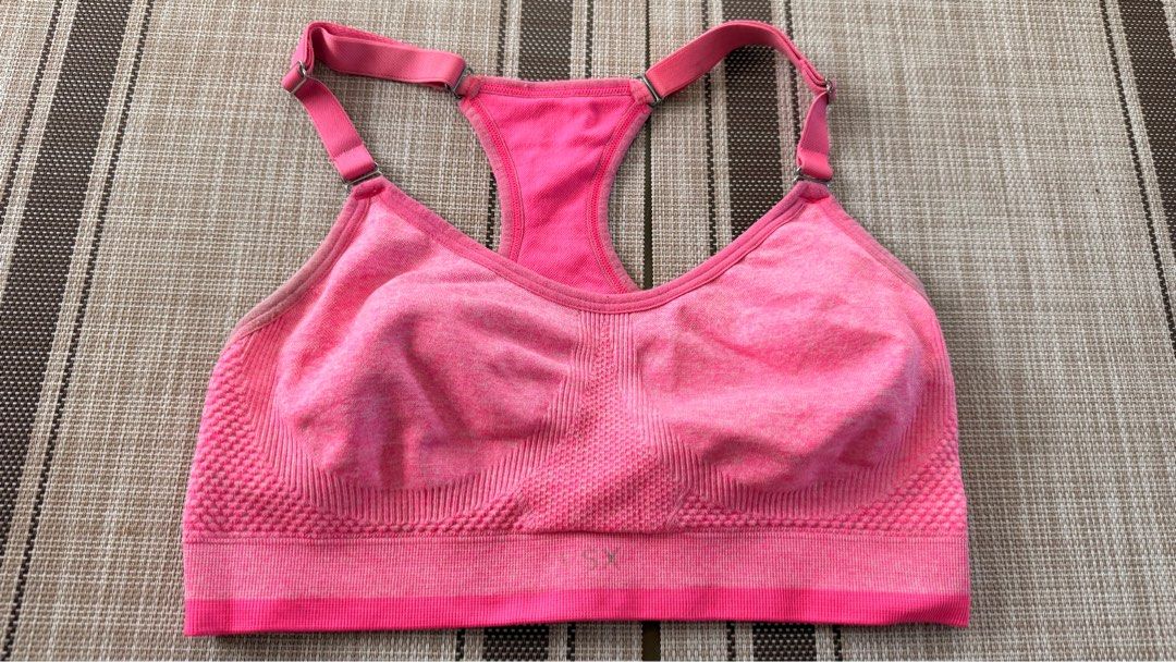 VSX Pink Sports Bra (Category: Activewear) located in San Fernando. Submitted by rizacarza (Listing ID 1410906019, Image 1). Description: - Pink VSX sports bra - Adjustable straps - Racerback design - Textured knit fabric - Wide bottom band - Measures approx. 10 inches across (laid flat) - VSX logo detail Super nice and ganda ng color in actual. 🥰.