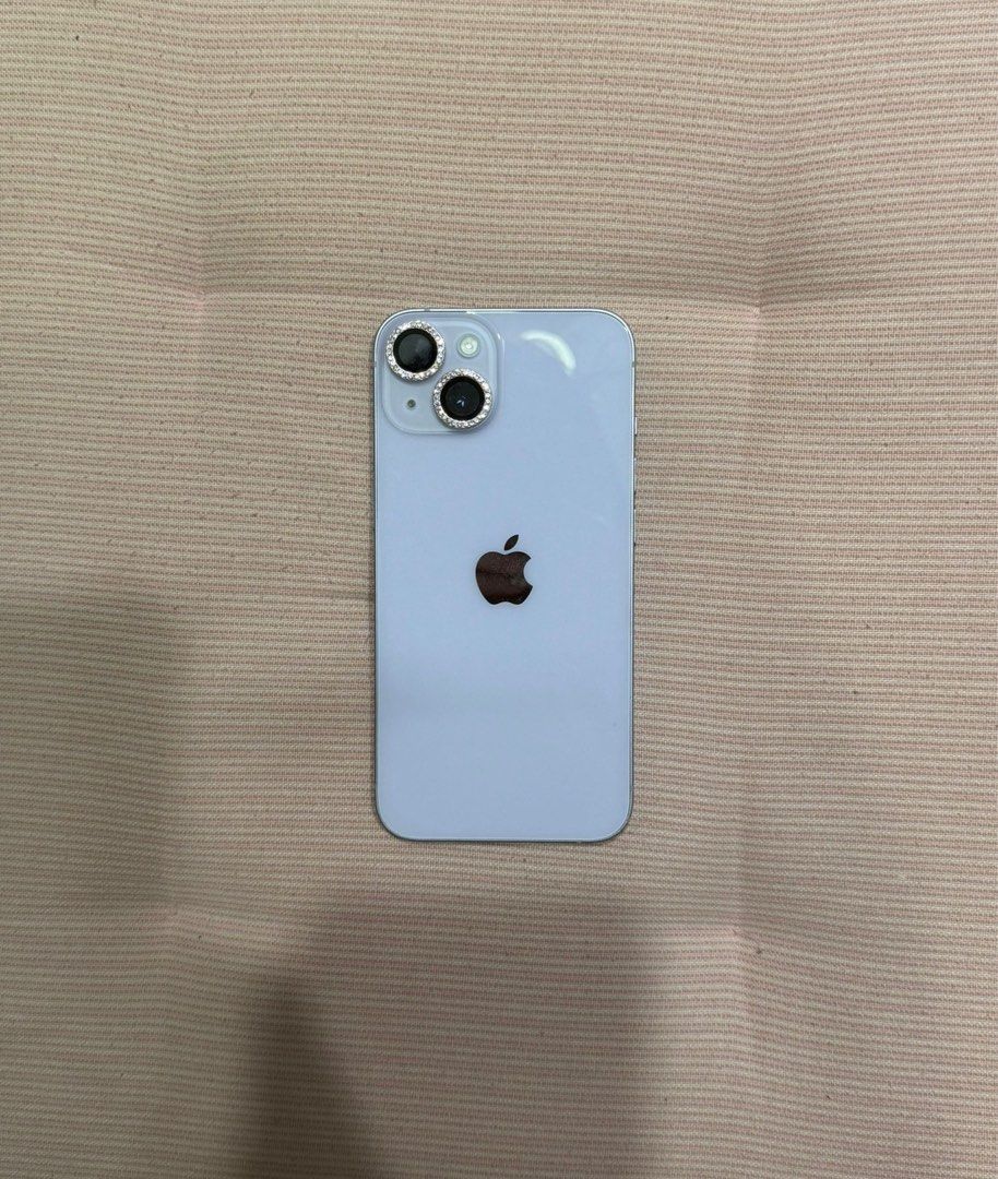(Category: iPhone 14 Series) located in Singapore. Submitted by tsukitrinkets (Listing ID 1411232185, Image 1). Description: comes with screen protector and lens protector, can be removed and changed no defects.