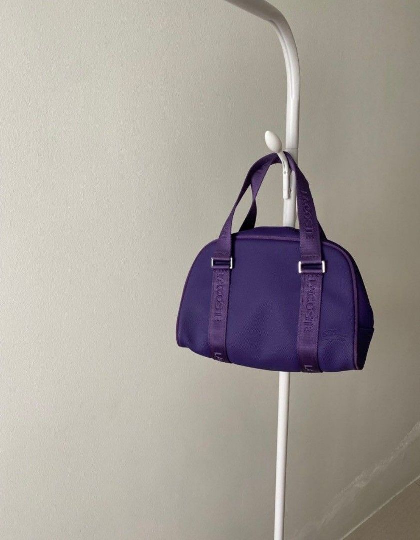 💯 % LACOSTE Classic Women Handbag (Category: Luxury Bags & Wallets) located in Davao. Submitted by iamjllanto (Listing ID 1411196653, Image 2). Description: 💯% LACOSTE Classic Small Handbag in excellent condition. RFS: Extra bag/Impulsive buying Color: Purple For sure buyer, just kindly pm me. Thanks :).