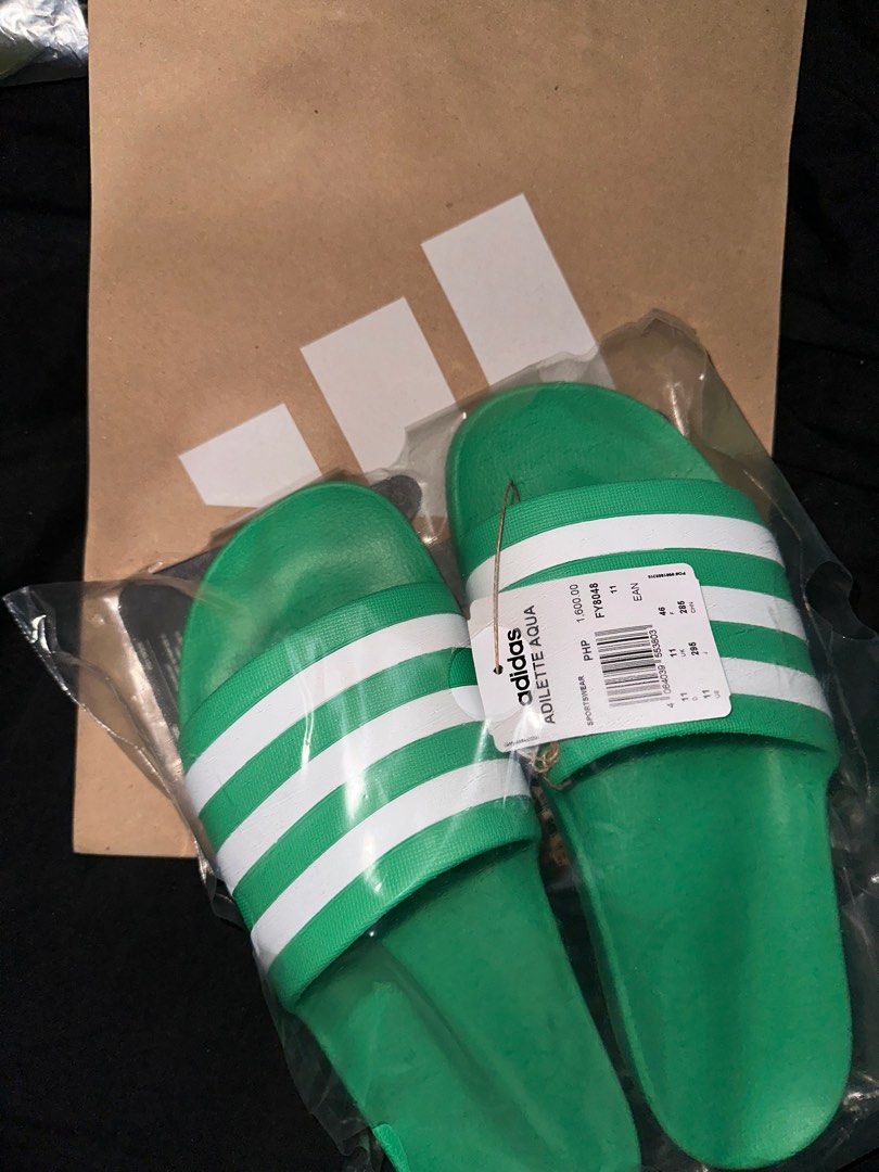 ADIDAS SLIDES size 11 (Category: Slippers & Slides) located in San Jose del Monte. Submitted by mdfckinglit (Listing ID 1411192850, Image 1). Description: STILL UNDER WARRANTY CAN REPLACE COLOR AND SIZE TILL JAN 5‼️ 100 auth from the outlet with paper bag.