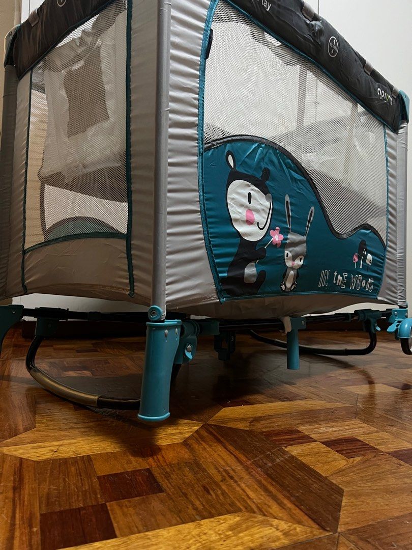 Apruva Crib/Playpen with Rocker (Category: Cots & Cribs) located in Manila. Submitted by zapantaesther (Listing ID 1411137351, Image 3). Description: Fixed Price na po sa 1,200. Issue/Flaw: tear on some parts see pictures for details. *needs cleaning -Playpen -Crib -Rocker -Mosquito Net -Compact -with bag.
