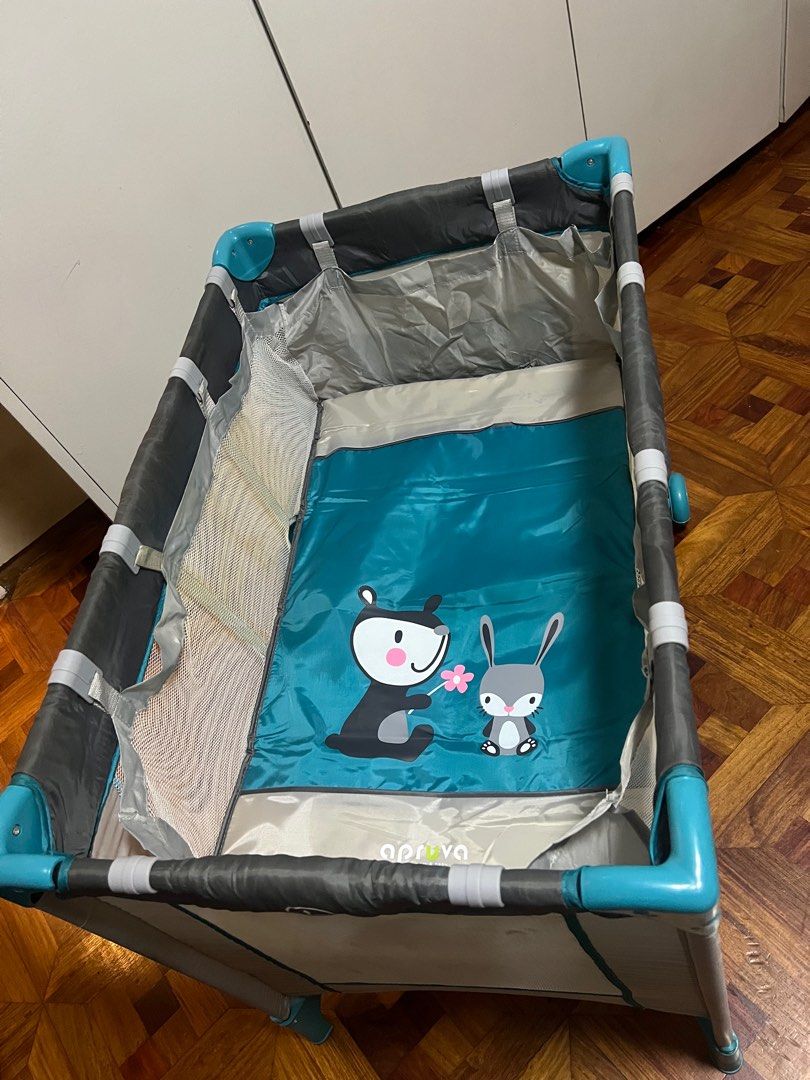 Apruva Crib/Playpen with Rocker (Category: Cots & Cribs) located in Manila. Submitted by zapantaesther (Listing ID 1411137351, Image 1). Description: Fixed Price na po sa 1,200. Issue/Flaw: tear on some parts see pictures for details. *needs cleaning -Playpen -Crib -Rocker -Mosquito Net -Compact -with bag.