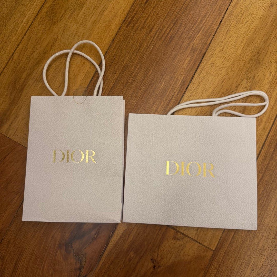 Authentic Dior Paper Bags (Category: Luxury Bags & Wallets) located in Las Pinas. Submitted by bubustings_ (Listing ID 1411195803, Image 1). Description: - Authentic Dior paper bags - Small size - LEFT 20cm x 26cm - RIGHT 27cm x 23cm - perfect for gifting or storage!.