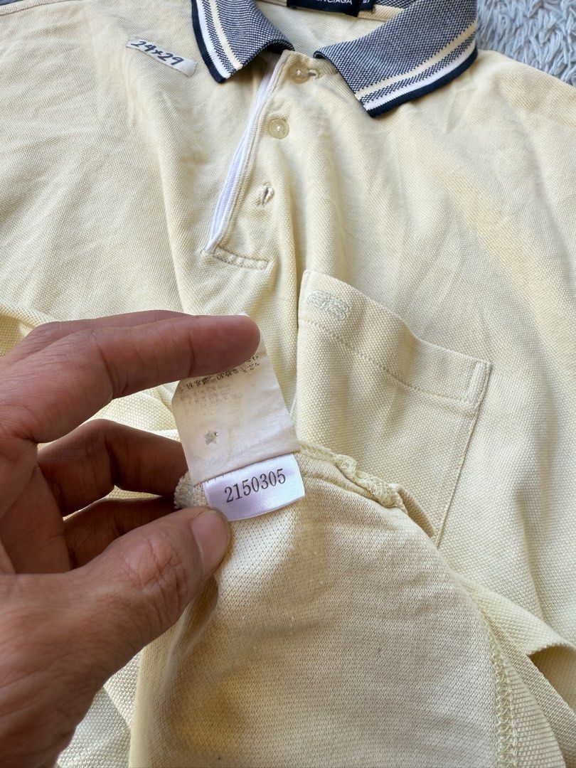 Balenciaga Polo Shirt (Category: Tshirts & Polo Shirts ) located in Legazpi City. Submitted by tiny0509 (Listing ID 1411167878, Image 3). Description: - Balenciaga cream-colored polo shirt - Features a chest pocket - Zipper closure - Contrasting collar and sleeve cuffs - Includes size tag - 24x29.