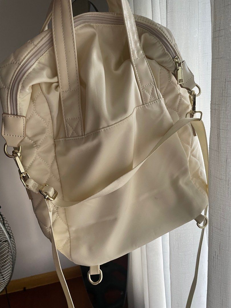 Bella Russo Quilted Backpack (Category: Backpacks) located in Manila. Submitted by b4wang (Listing ID 1411178719, Image 2). Description: - Bella Russo quilted 2-in-1 bag - Top handle and detachable shoulder strap - Can be backpack or handheld/tote - Front zippered pocket - Main compartment - Diamond-patterned quilting - Gold-toned hardware - Spacious interior - Simple and elegant design - with dust bag - dm for more photos.