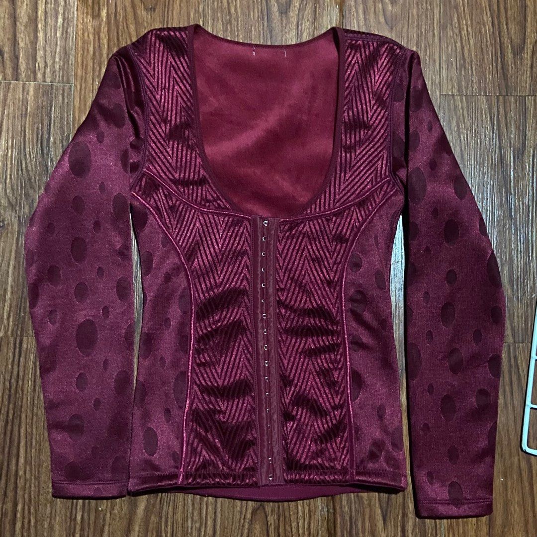 burgundy corset longsleeve top (Category: Longsleeves) located in Valenzuela. Submitted by ryuaku (Listing ID 1411196223, Image 1). Description: - Burgundy long sleeve top - Unique design with hook and eye closure - Polka dot pattern on sleeves - Velvet-like texture - Chevron pattern on front - Scoop neckline.
