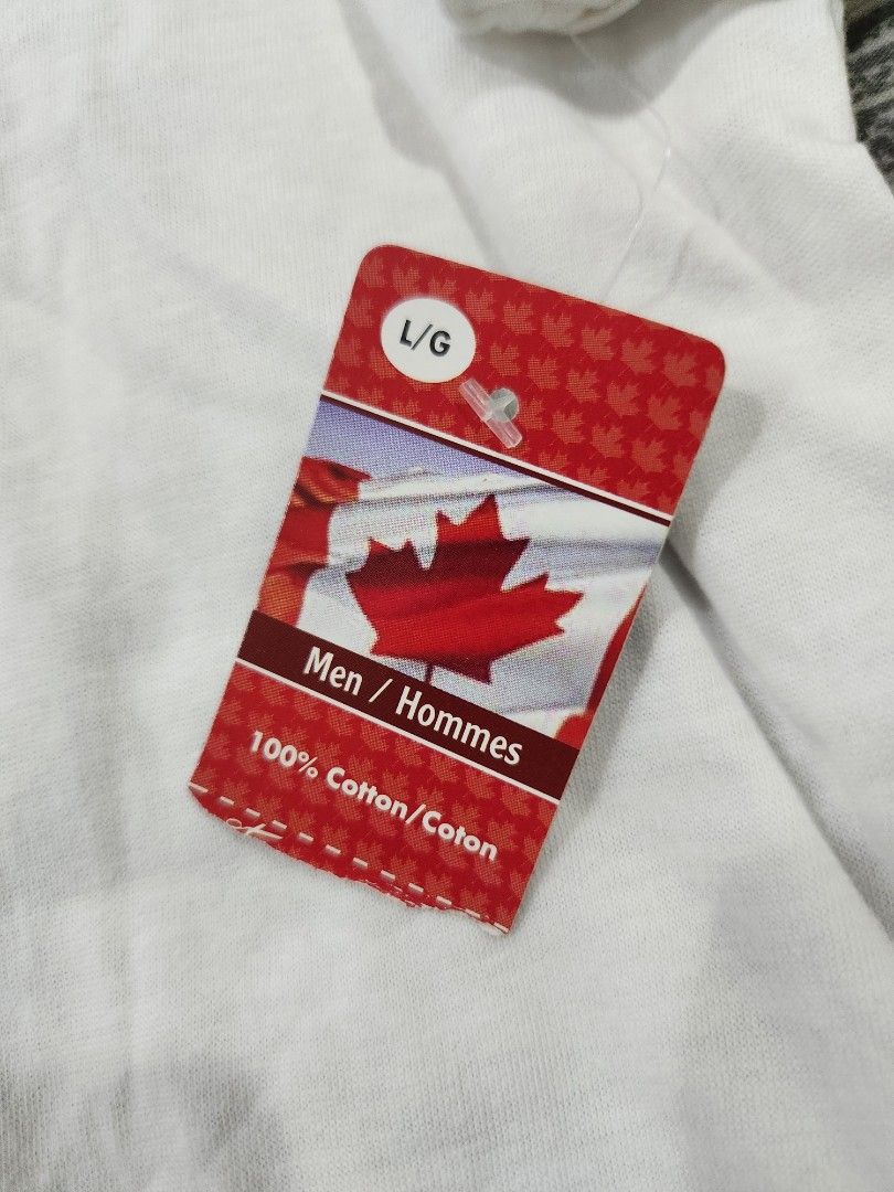 Canada Flag Graphic Men's Shirt (Category: Tshirts & Polo Shirts ) located in San Juan City. Submitted by iamryn (Listing ID 1411239274, Image 2). Description: - White t-shirt - Features a Canada flag graphic with snowflake design - Size: L - Made of 100% cotton - Brand new with tag **FREE if you purchase another of my item.