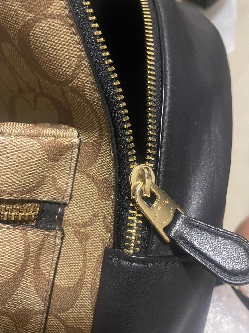 Coach backpack (Category: Luxury Bags & Wallets) located in General Trias. Submitted by cris4 (Listing ID 1411207102, Image 3). Description: Coach backpack in good condition Gold harware Zipper working Pvc material L 10” H 11”.
