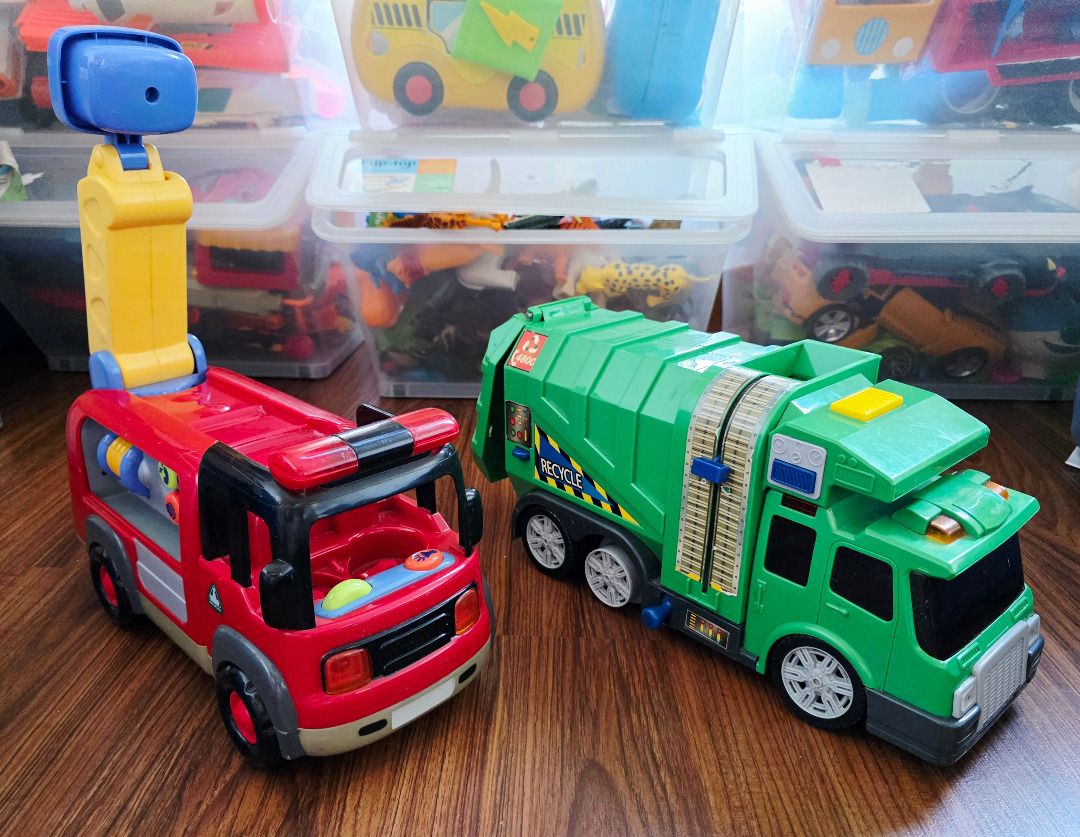 Fire Truck and Garbage Truck (Category: Kids Toys) located in Pasig City. Submitted by eeioo (Listing ID 1411182617, Image 3). Description: - Includes two toy trucks: - Red fire truck with extending ladder and control panel. - Green garbage truck with opening compartment and detailed side design. • Actual picture posted, as is where is. • RFS: Outgrown. • Payment via GCash, BPI, BDO, Cash upon pickup. • Fixed price, no last price inquiry please. 