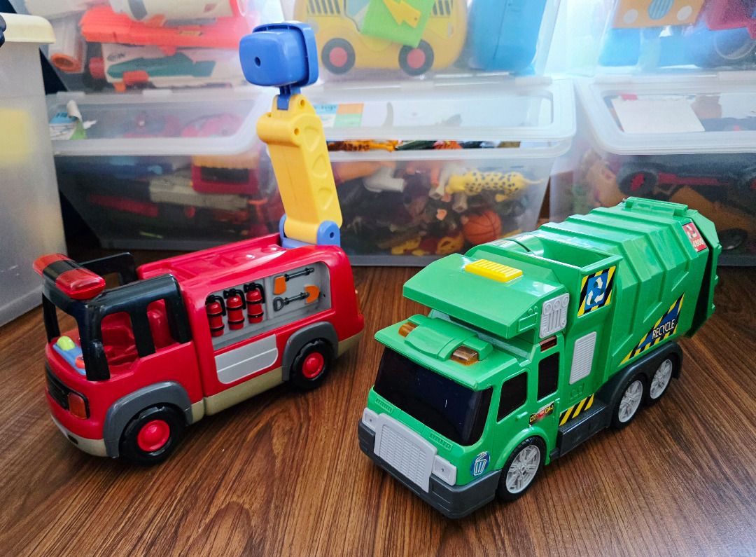 Fire Truck and Garbage Truck (Category: Kids Toys) located in Pasig City. Submitted by eeioo (Listing ID 1411182617, Image 2). Description: - Includes two toy trucks: - Red fire truck with extending ladder and control panel. - Green garbage truck with opening compartment and detailed side design. • Actual picture posted, as is where is. • RFS: Outgrown. • Payment via GCash, BPI, BDO, Cash upon pickup. • Fixed price, no last price inquiry please. 