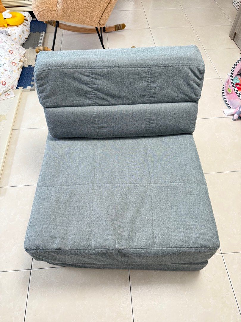 Foldable Sofa Bed (Category: Bedding & Towels) located in Singapore. Submitted by fayfay2117 (Listing ID 1411113613, Image 2). Description: - Dreamax foldable sofa bed - Converts easily from sofa to bed - Adjustable backrest for multiple angles - Removable and washable cover - Great for small spaces or guest bed - Delivery +$10 islandwide.