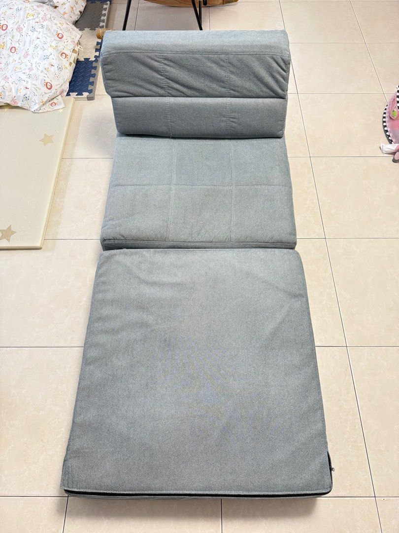 Foldable Sofa Bed (Category: Bedding & Towels) located in Singapore. Submitted by fayfay2117 (Listing ID 1411113613, Image 1). Description: - Dreamax foldable sofa bed - Converts easily from sofa to bed - Adjustable backrest for multiple angles - Removable and washable cover - Great for small spaces or guest bed - Delivery +$10 islandwide.