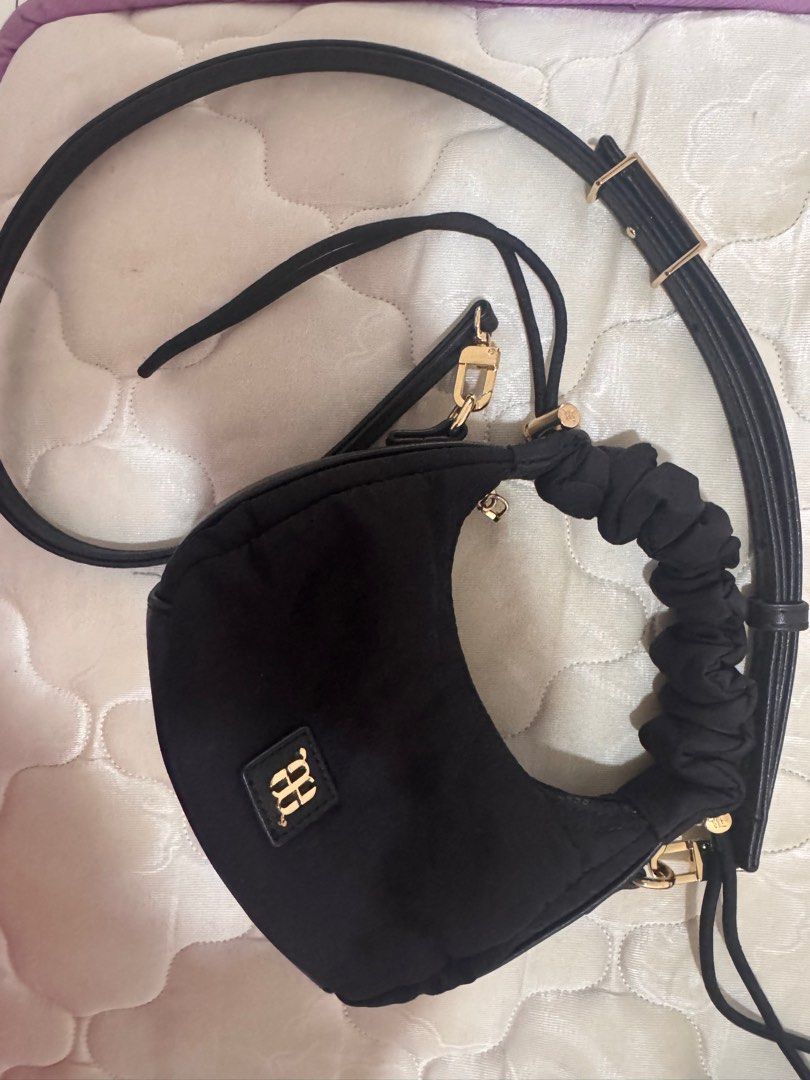 FUFFA MICRO (Category: Cross-body Bags) located in Bentong. Submitted by lily.zea (Listing ID 1411152991, Image 3). Description: Black nylon, lightly use. .