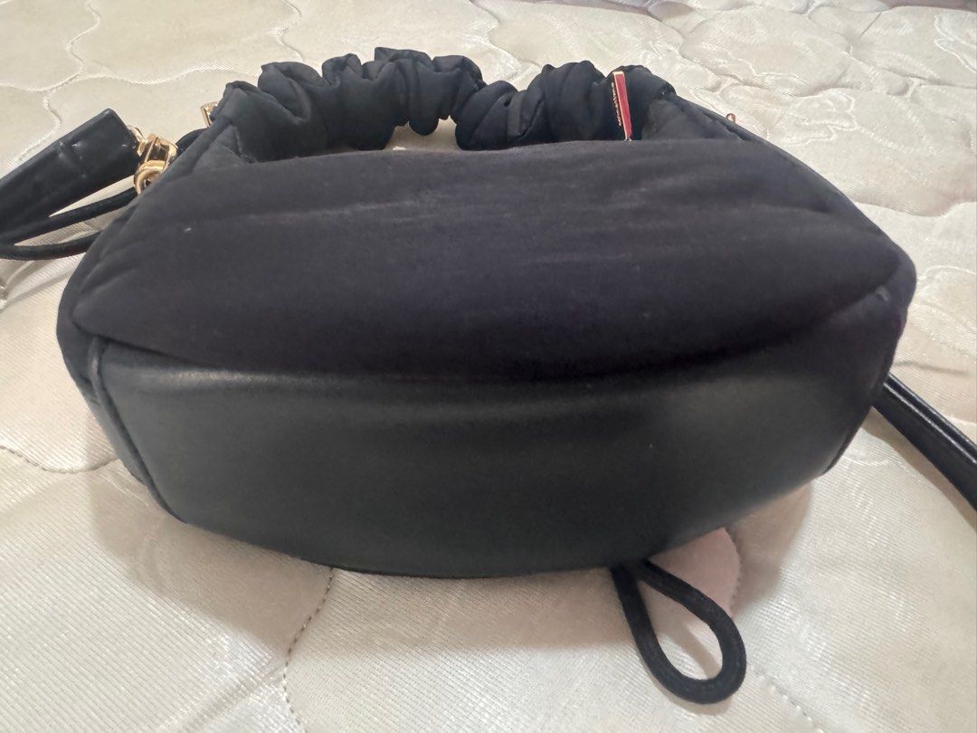 FUFFA MICRO (Category: Cross-body Bags) located in Bentong. Submitted by lily.zea (Listing ID 1411152991, Image 2). Description: Black nylon, lightly use. .