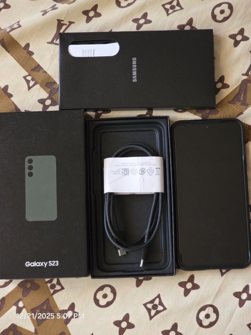 Galaxy S23 256GB NTC (Local Unit) (Category: Samsung) located in Muntinlupa City. Submitted by gerald520 (Listing ID 1411085735, Image 2). Description: Selling well loved Galaxy S23 256GB - Local unit NTC approved - Original Cable and box still intact and working - no repair history, no issues - tempered glass installed since day 1 bought from Samsung Store June 2023 freebies: cases (nilkin, ringke, etc) extra tempered glass(smart devil).