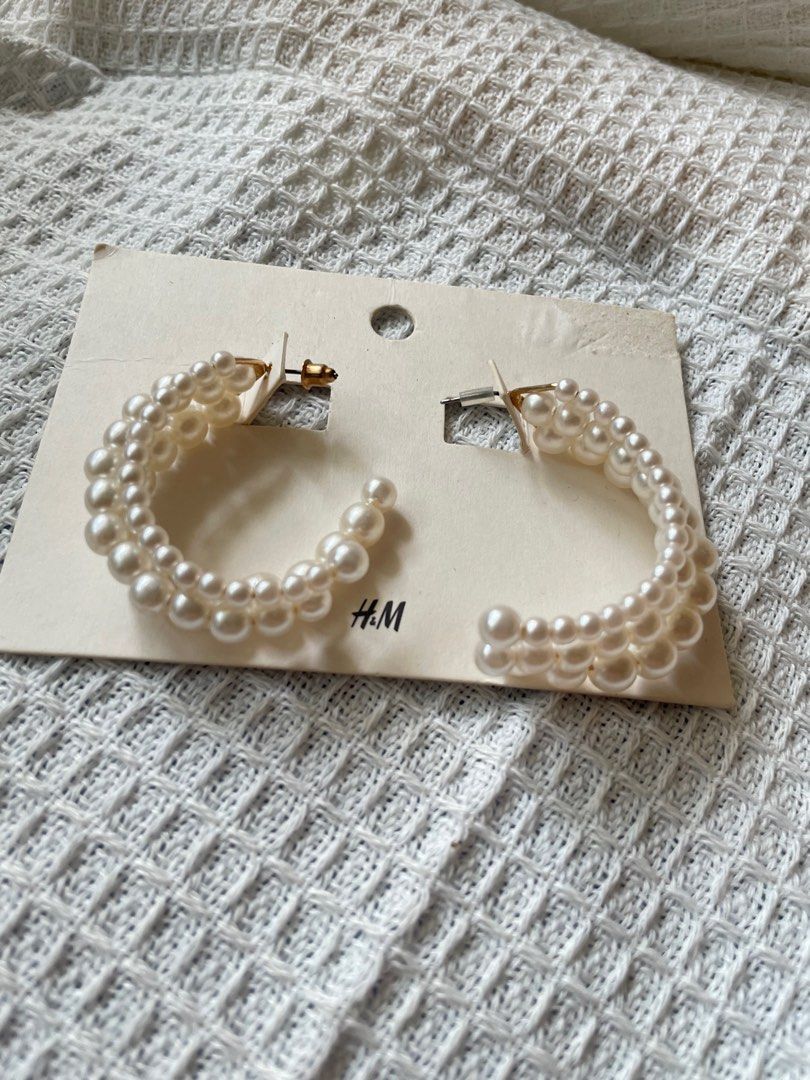 H&M Pearl Hoop Earrings (Category: Earrings) located in Pasig City. Submitted by AlbertCruz97 (Listing ID 1411134528, Image 2). Description: - H&M hoop earrings - Layered design - Features faux pearls - Post back closure - Lightweight and comfortable.