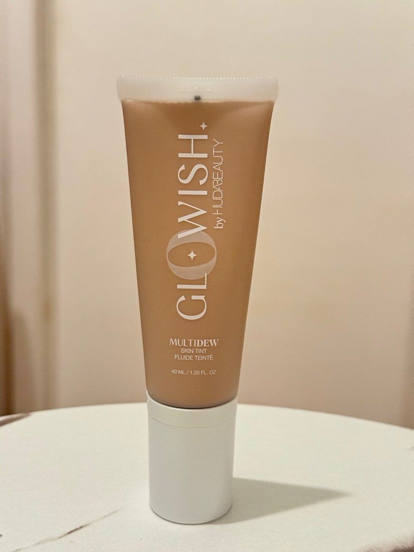 Huda Beauty GloWish Multidew Vegan Foundation in 04 Light Medium 40mL (Category: Makeup) located in Quezon City. Submitted by quirksandcurls (Listing ID 1411174207, Image 1). Description: .
