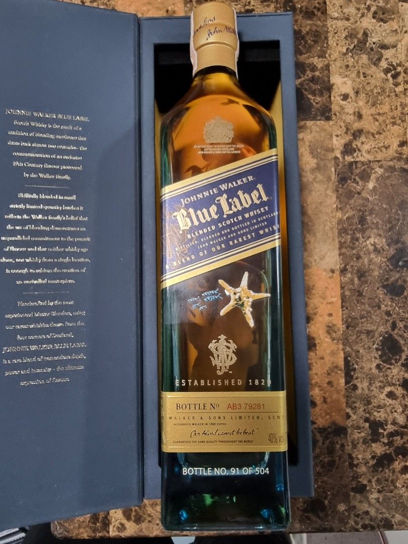 Johnnie Walker Blue Label Limited Edition Cebu (Category: Beverages) located in Caloocan City. Submitted by brydgreat (Listing ID 1411211560, Image 1). Description: Johnnie Walker Blue Label limited edition bottle. The bottle features intricate artwork. It comes in a presentation box. The box has a dark blue exterior with text on the inside..