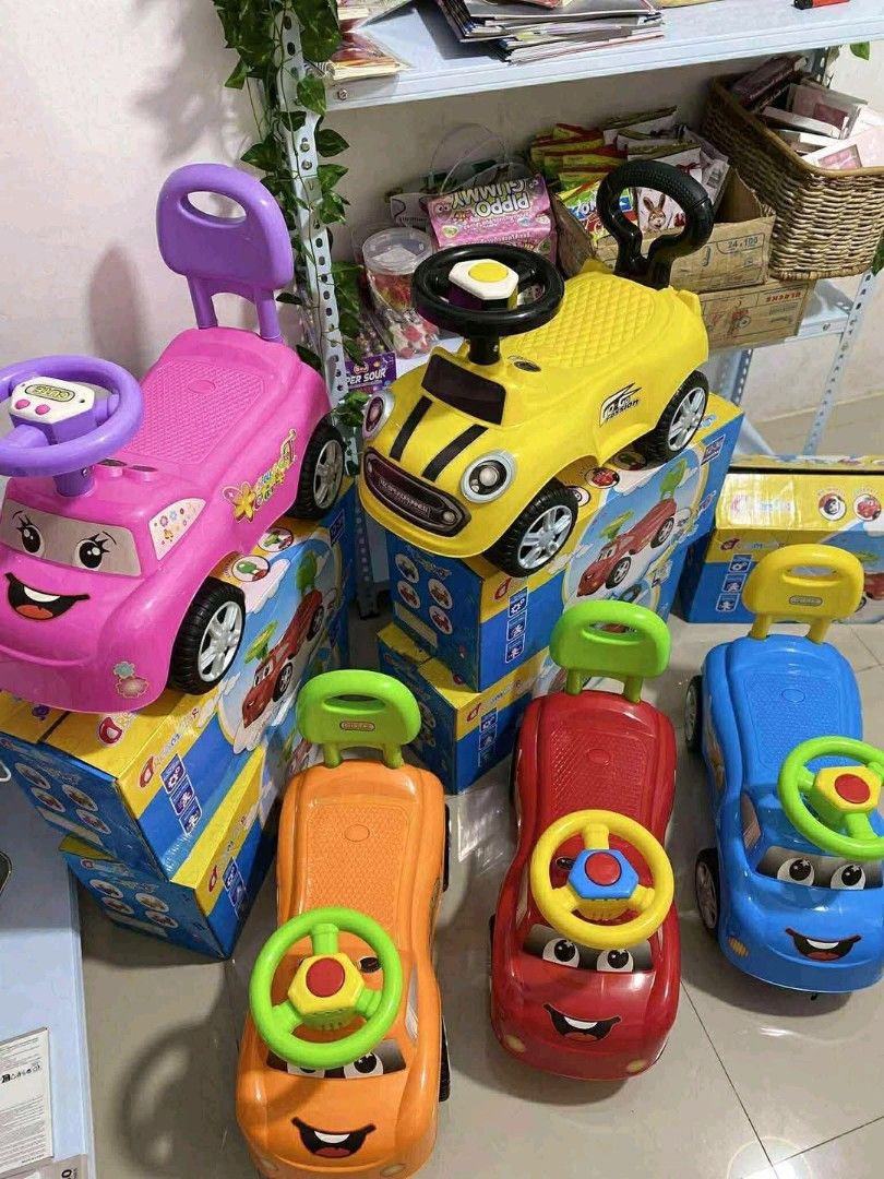 Kids Ride-on Car (Category: Babies & Kids Fashion) located in Caloocan City. Submitted by youngdog_7a3ee7 (Listing ID 1411249717, Image 2). Description: - Ride-on car for toddlers - Available colors: Pink, Yellow, Orange, Red, Blue - Features a steering wheel - Includes a push handle - Price: ₱1,199.00.