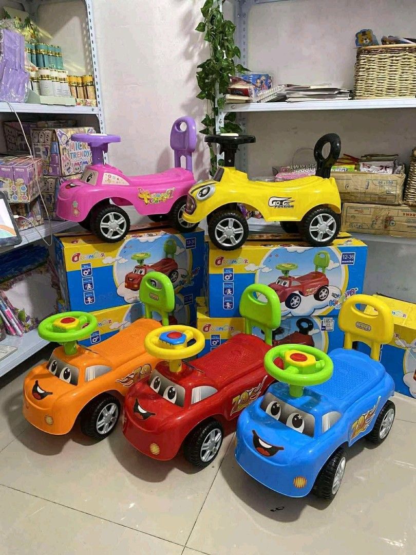 Kids Ride-on Car (Category: Babies & Kids Fashion) located in Caloocan City. Submitted by youngdog_7a3ee7 (Listing ID 1411249717, Image 1). Description: - Ride-on car for toddlers - Available colors: Pink, Yellow, Orange, Red, Blue - Features a steering wheel - Includes a push handle - Price: ₱1,199.00.