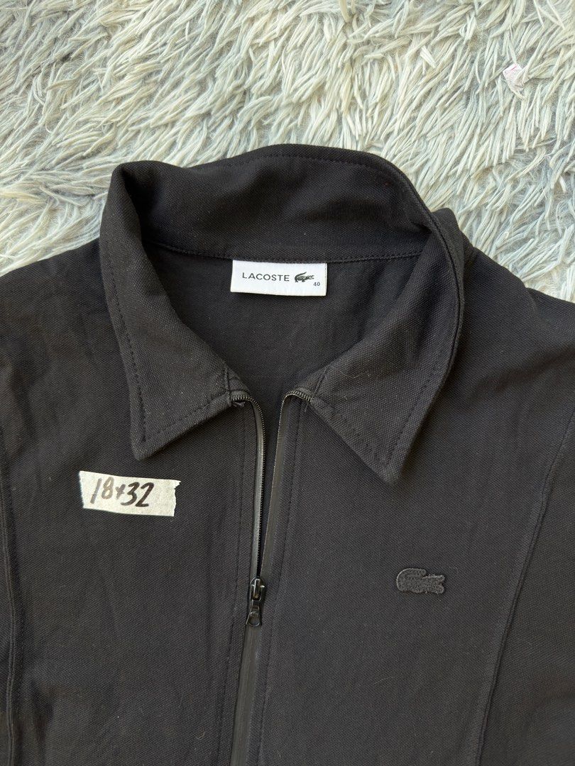 Lacoste Black Dress (Category: Dresses) located in Legazpi City. Submitted by tiny0509 (Listing ID 1411169429, Image 2). Description: - Black Lacoste dress - Size 42 - Collared neckline - Zipper closure - Short sleeves with blue and white trim - Lacoste logo on chest - Fitted bodice - Flared skirt.