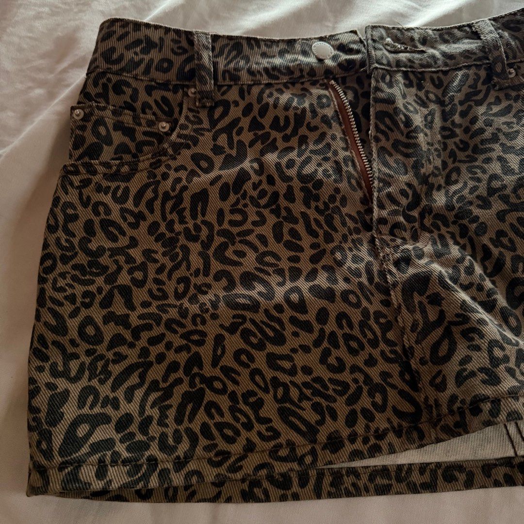 Leopard Print Mini Skirt Y2k (Category: Skirts) located in Marikina City. Submitted by eyeftee (Listing ID 1411255015, Image 3). Description: Leopard print mini skirt - type: bodycon / good fit - zipper closure - front and back pockets - durable and comfortable fabric - bought for ₱478 # used only once for paskuhan :).